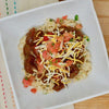 Zedrics Carne Guisada Over Cilantro Lime Brown Rice